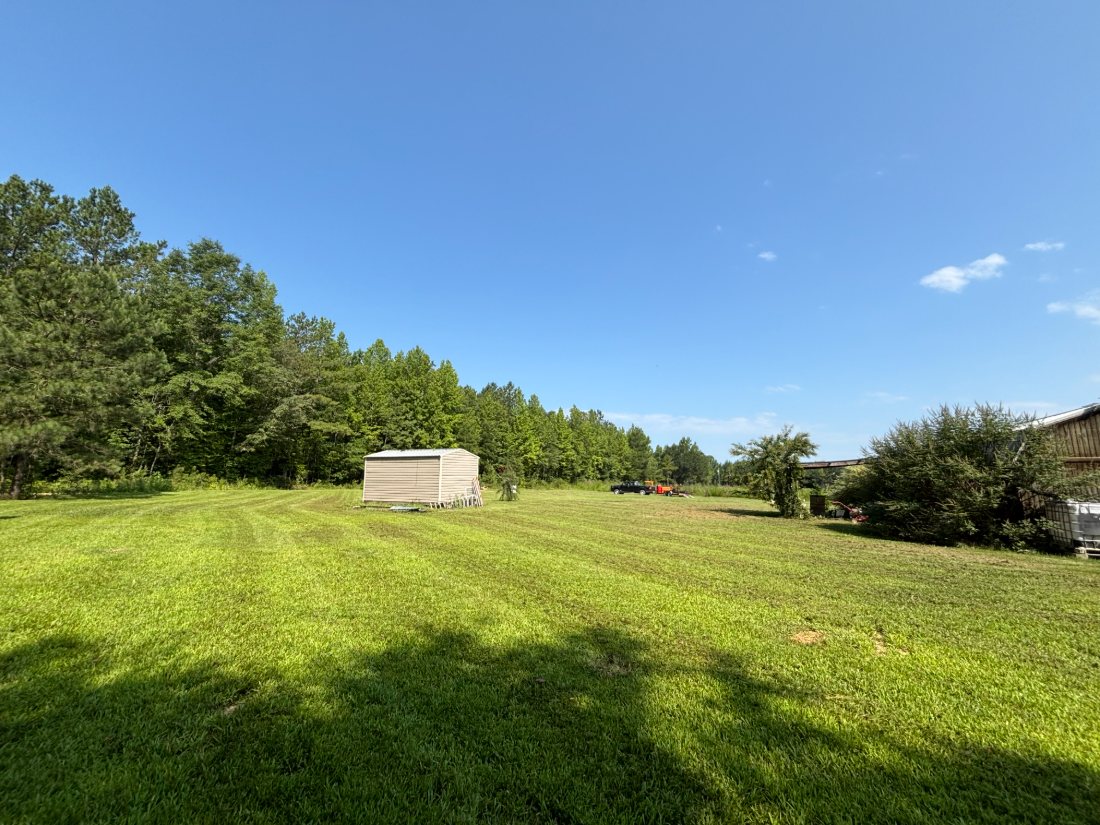 Large open acreage lot, mowed and maintained